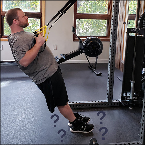 TRX Suspension Trainer for suspension training exercises, including chest, back, arms, legs, abs, core, and glutes.